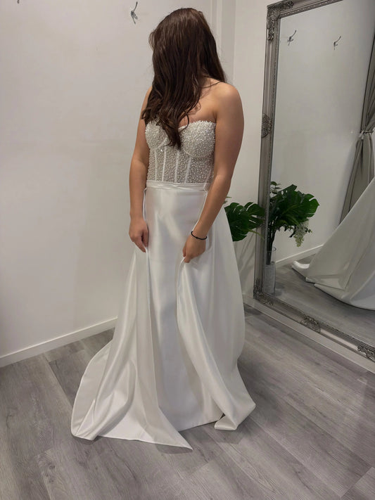 Front view of the Selene beaded corset wedding dress Melbourne – pearl embellished strapless bodice with flowing satin skirt at Divine Bridal Macleod