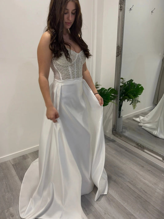 Front view of the Selene beaded corset wedding dress Melbourne – pearl embellished strapless bodice with flowing satin skirt at Divine Bridal Macleod