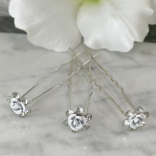 Chic Flower Hairpins with a central floral design and sparkling stones, perfect for enhancing hairstyles with a touch of sophistication and glamour.