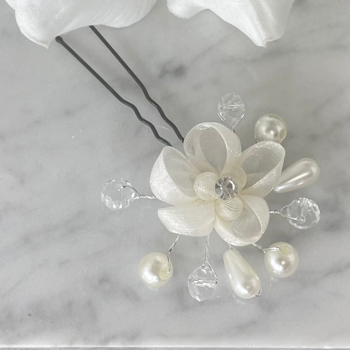 Chic Flower, Diamantés, and Pearl Hairpins featuring a black pin with organza flower, crystals, and pearls, ideal for adding elegance and sparkle to bridal and everyday hairstyles.