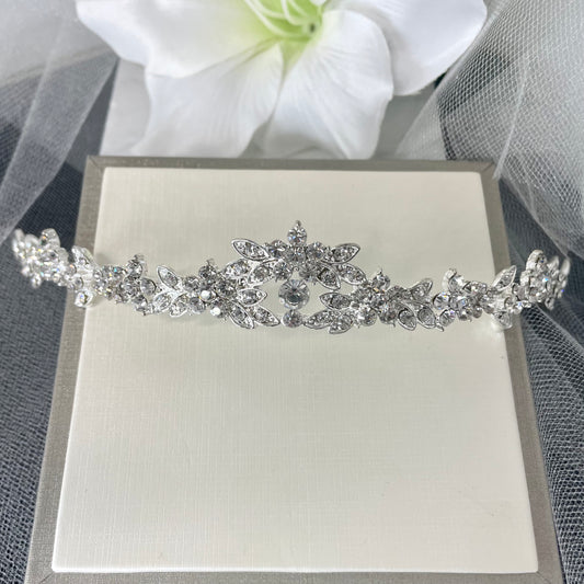 Indiana Diamanté Tiara featuring scattered diamantés that sparkle brilliantly, perfect for enhancing bridal and formal looks with a touch of regal elegance.