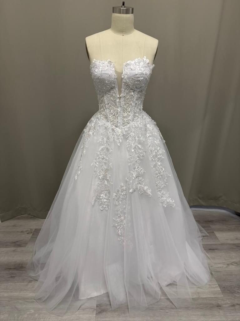 Josie Lace Appliqué Strapless Debutante Ball Gown close-up of intricate lace appliqués and sweetheart neckline
