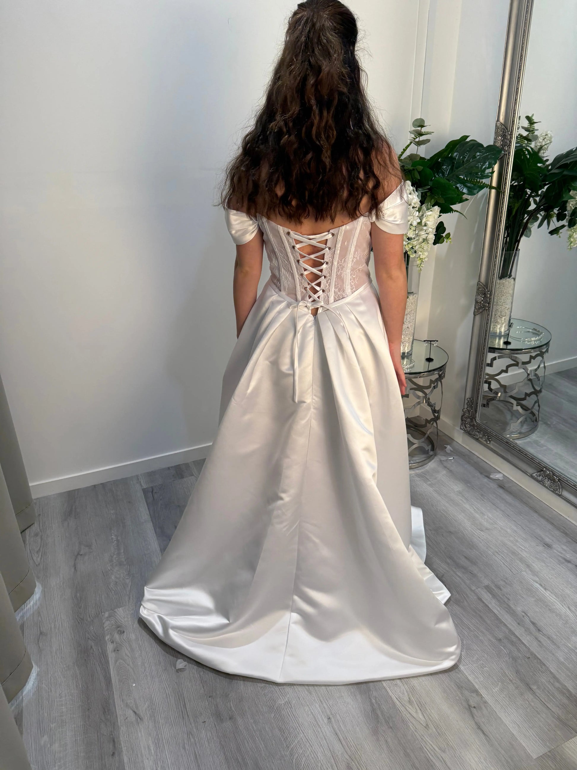 girl showcasing the back of the dress