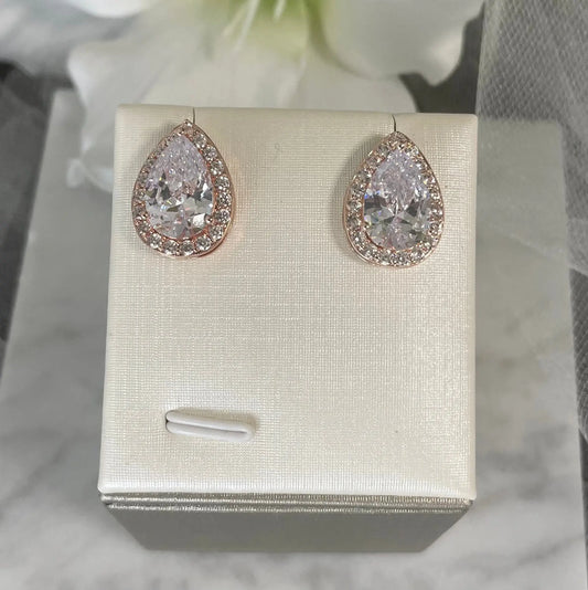 Lizzie Crystal Stud Earrings: Pear and Baguette Elegance.