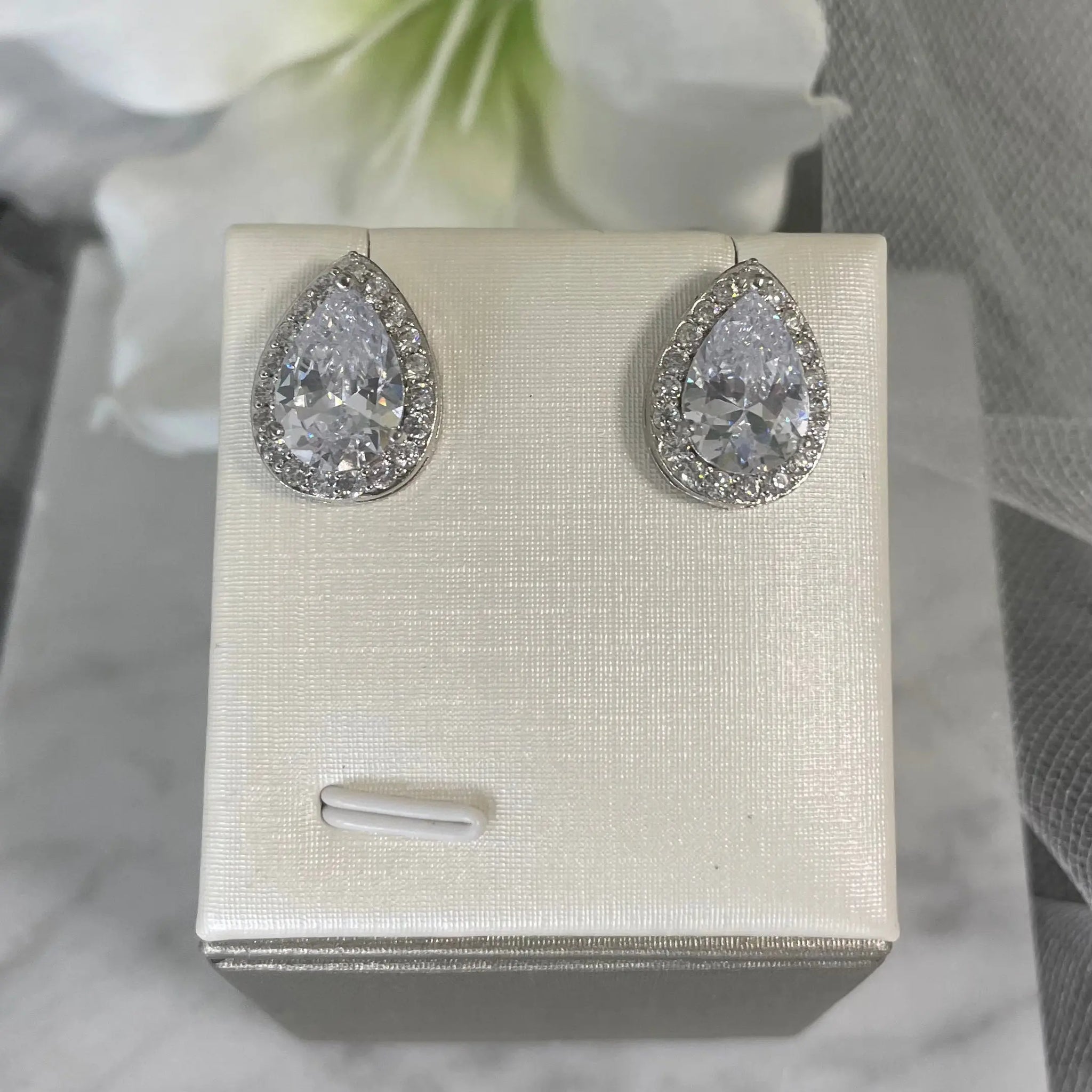 Lizzie Crystal Stud Earrings: Pear and Baguette Elegance.