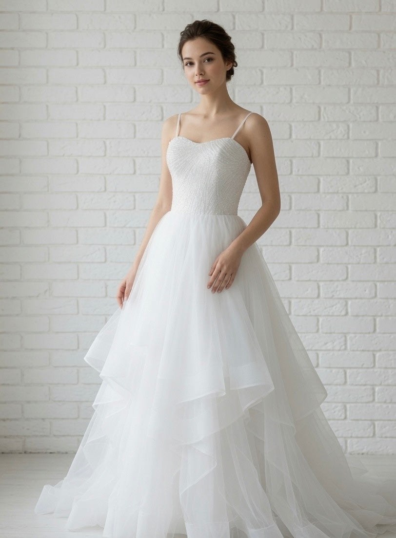 Luna Beaded Strapless Sweetheart Ruffled Tulle White Debutante Ball Gown front view - sparkling beaded corset and dramatic ruffled skirt