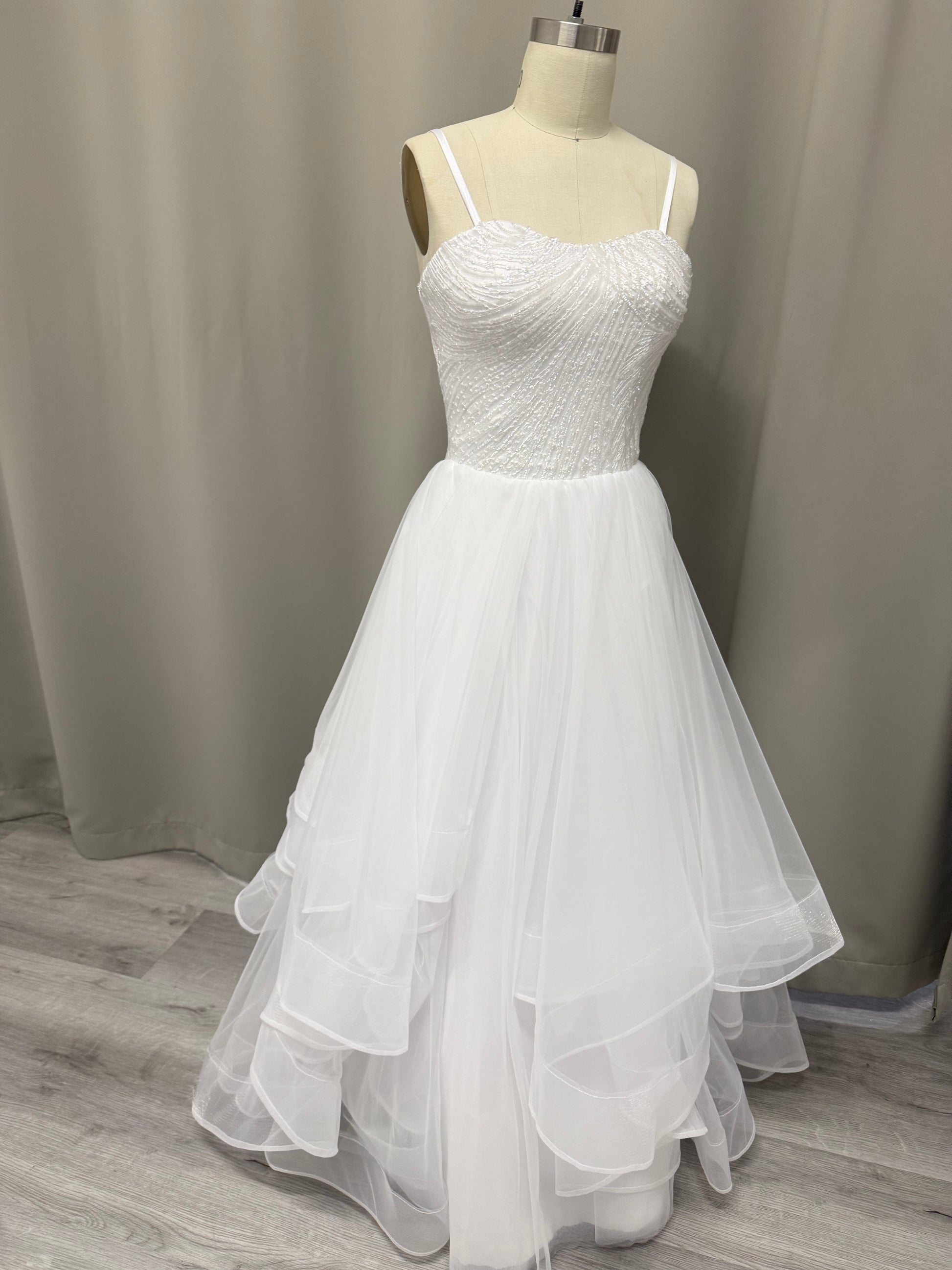 Luna Beaded Strapless Debutante Ball Gown on mannequin - heavily beaded sweetheart corset with ruffled tulle skirt