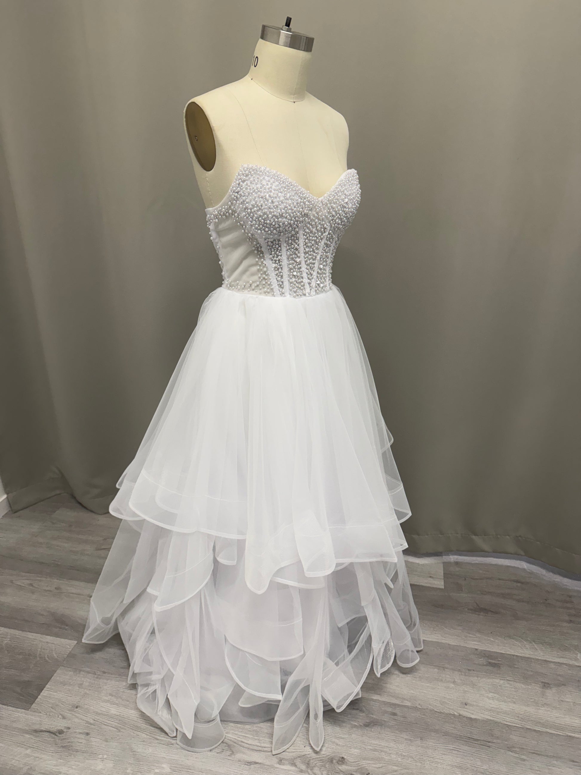 Lyra Ruffled Pearl Beaded Strapless Debutante Ball Gown.