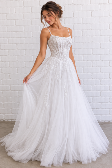 Molly V1 white spaghetti strap debutante dress, front view on mannequin with beaded corset and full tulle skirt
