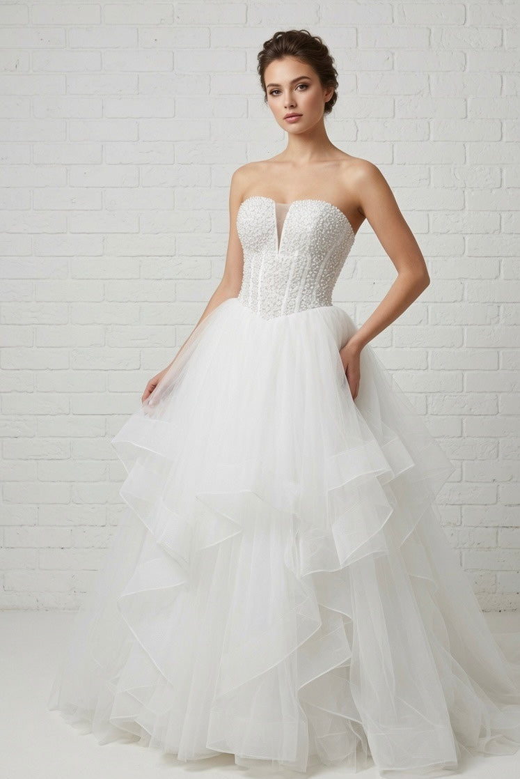 Ophelia Ruffled Pearl Beaded Strapless White Debutante Ball Gown front view - heavily embellished pearl corset and dramatic ruffled tulle skirt