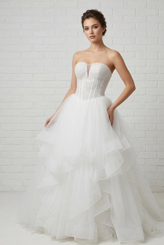 Ophelia Ruffled Pearl Beaded Strapless White Debutante Ball Gown front view - heavily embellished pearl corset and dramatic ruffled tulle skirt