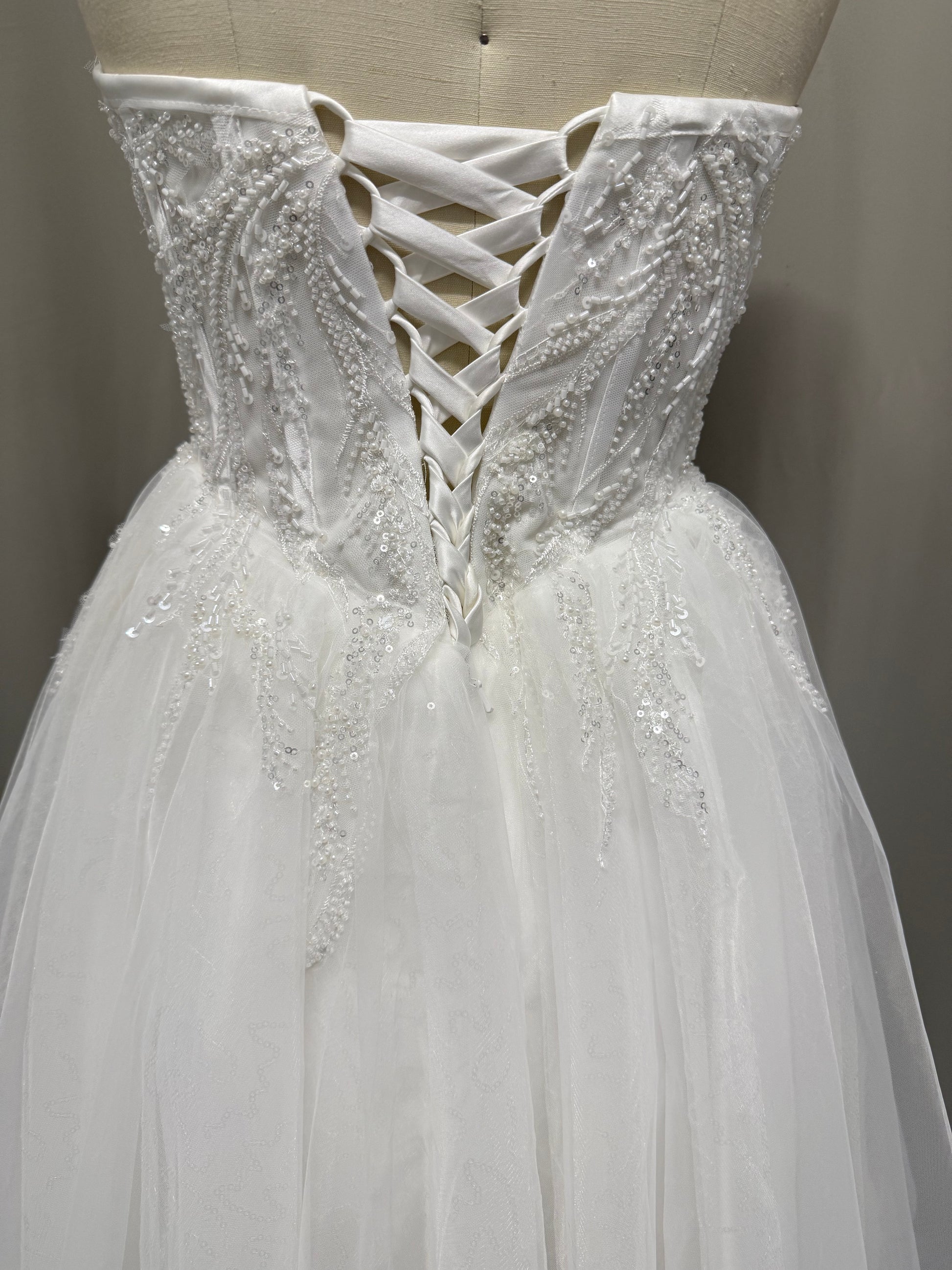 Pearl corset mini wedding dress back — satin lace-up corset