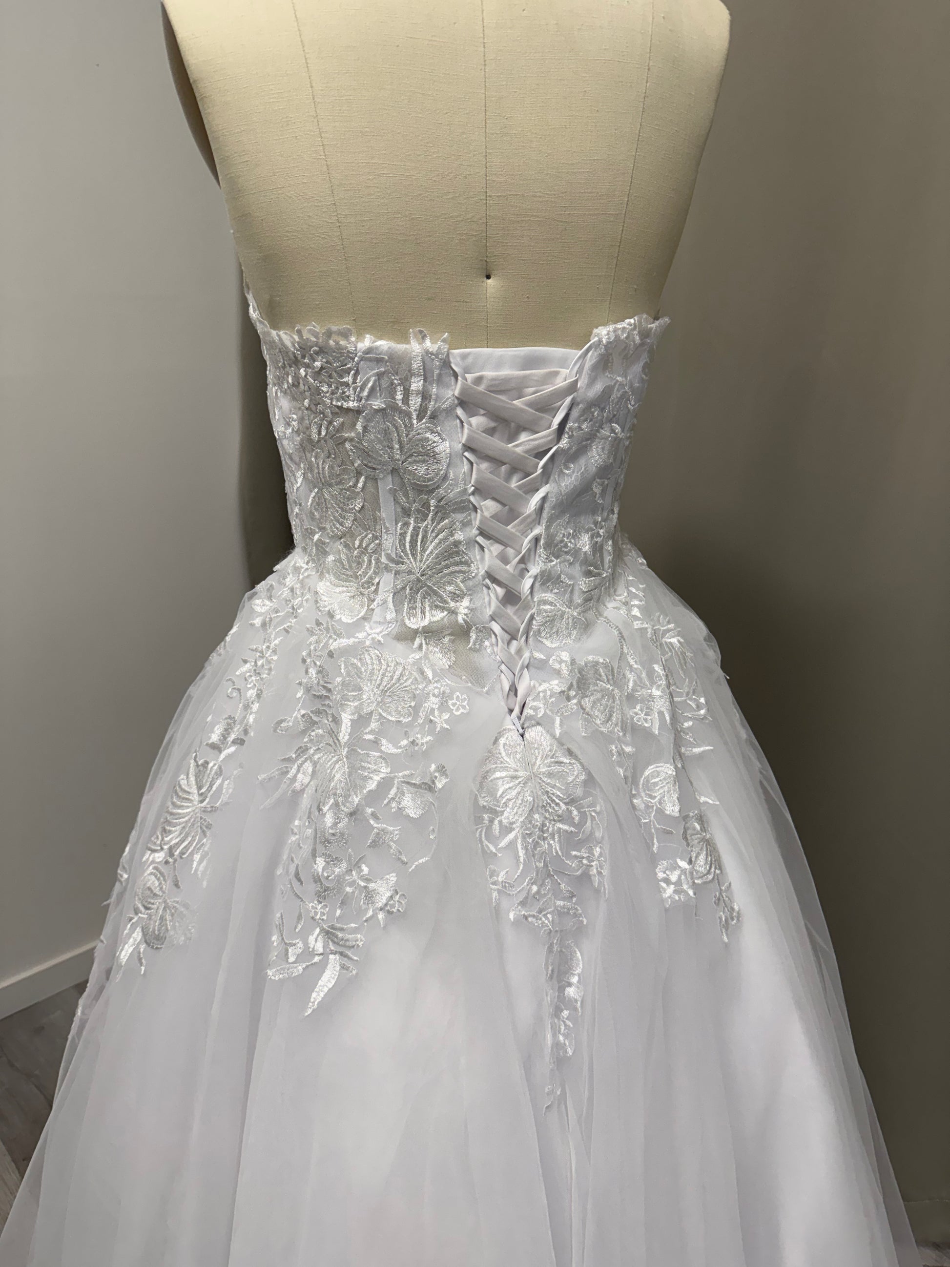 Full length Paris White Lace Strapless Debutante Ball Gown on mannequin - perfect for Melbourne debutante balls