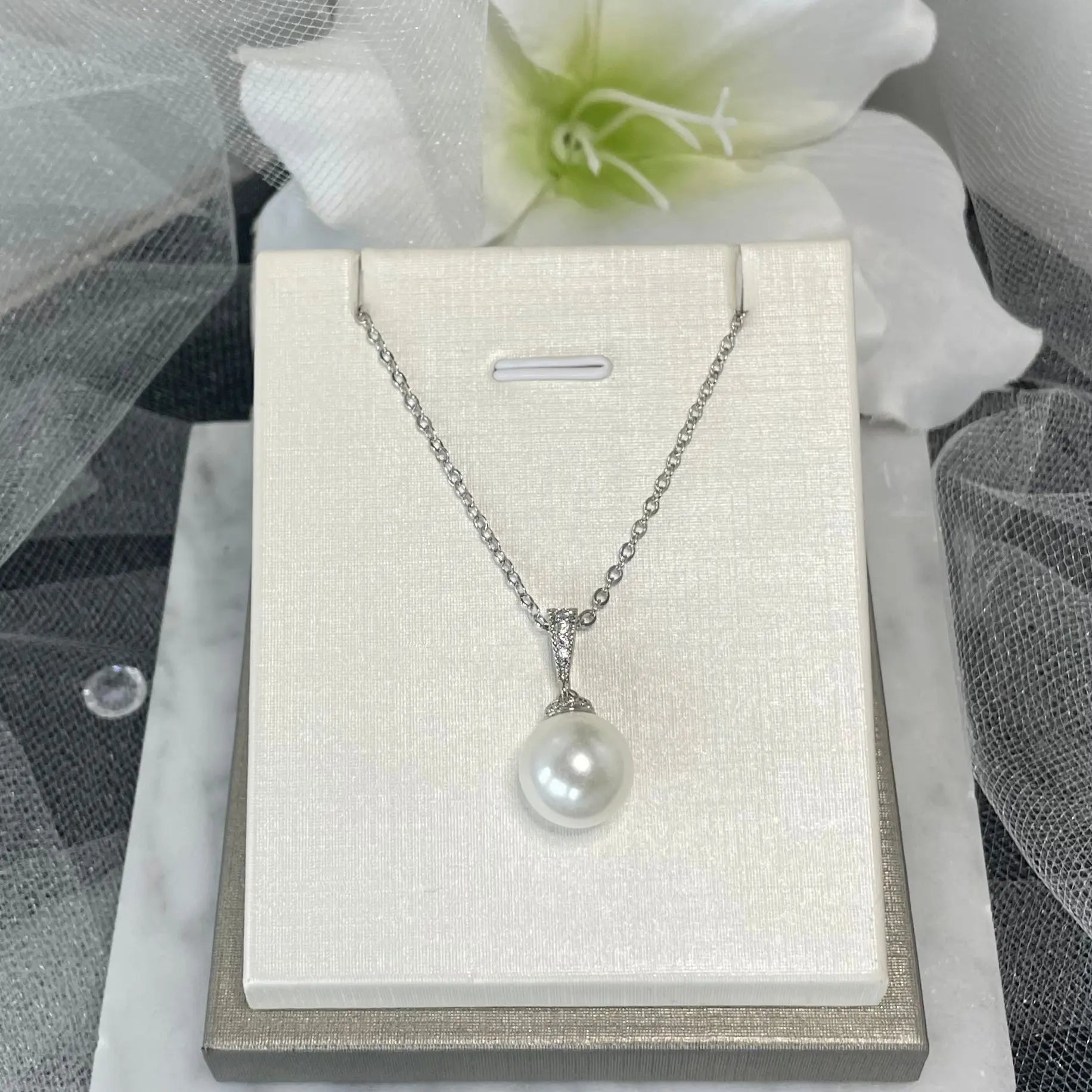Rite necklace pearl jewellery.