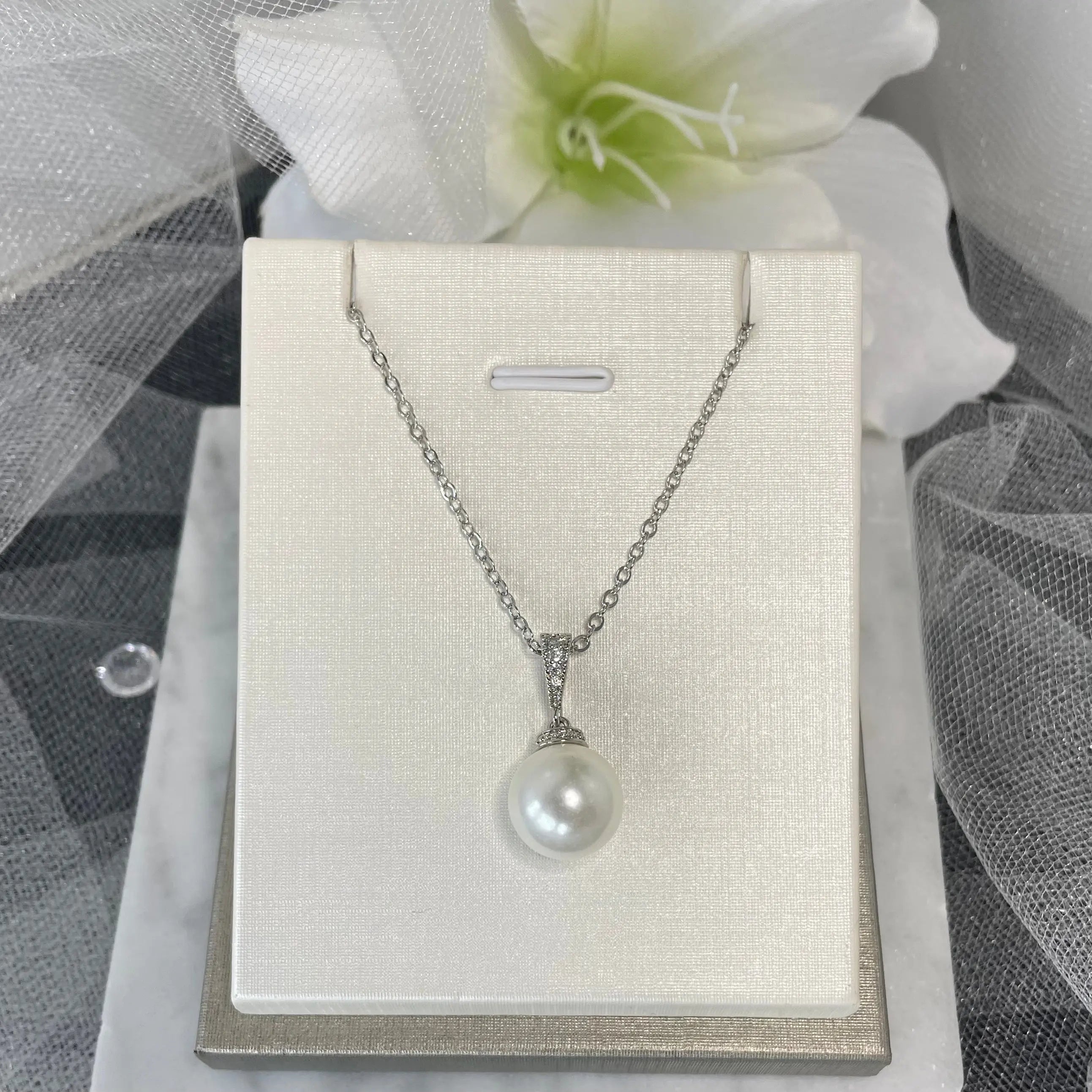 Rite necklace pearl jewellery.