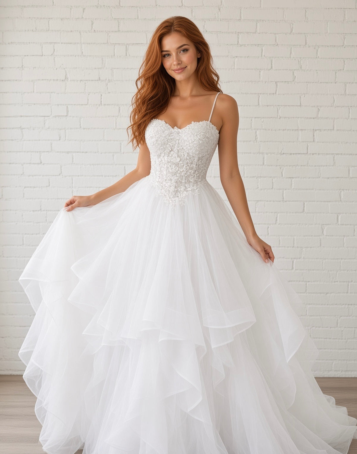 Riva white lace debutante dress, front view on model with pearl straps, sweetheart bodice and layered tulle skirt