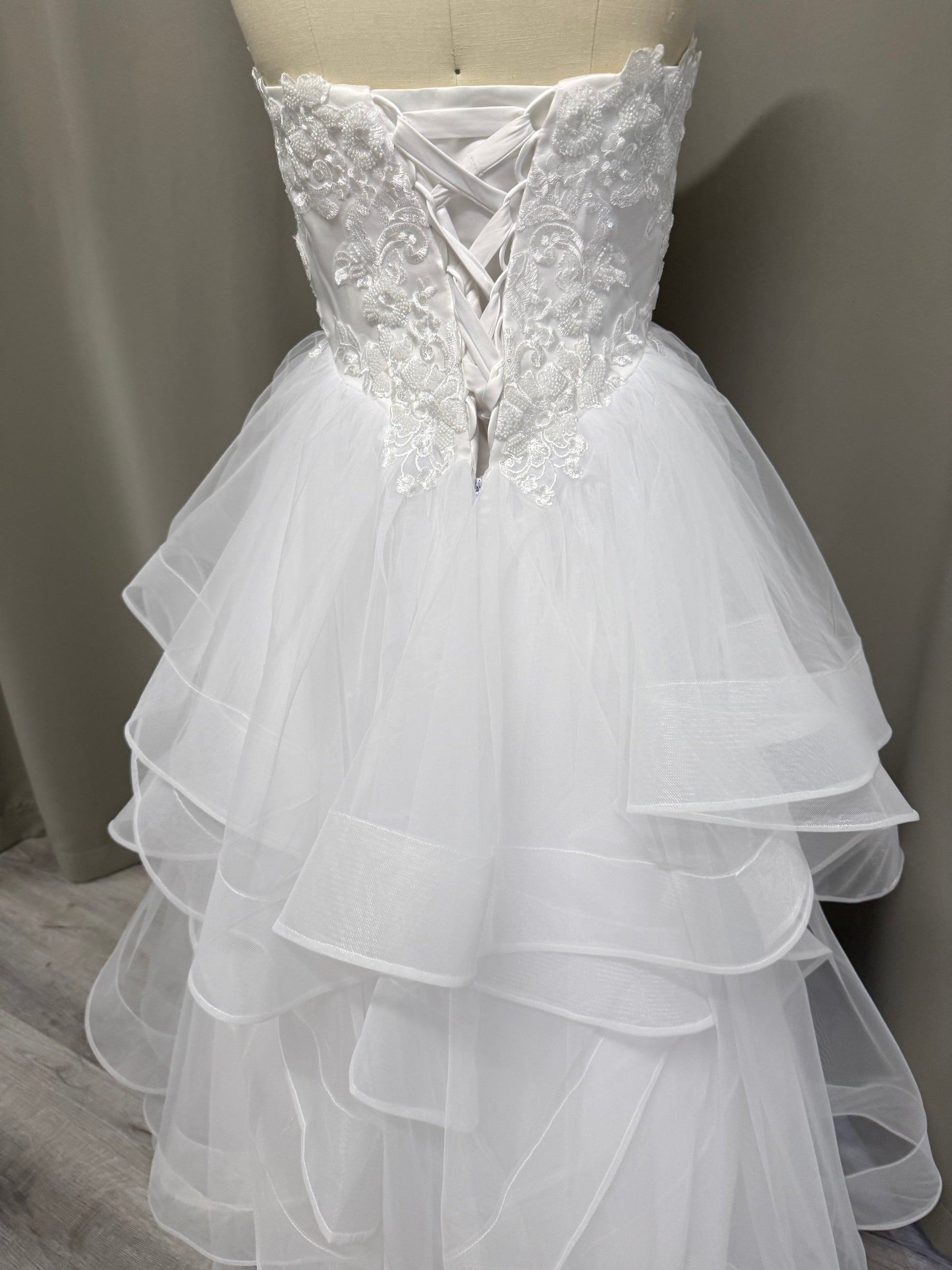 Back view of the Ruby lace ruffle debutante dress Melbourne with lace details