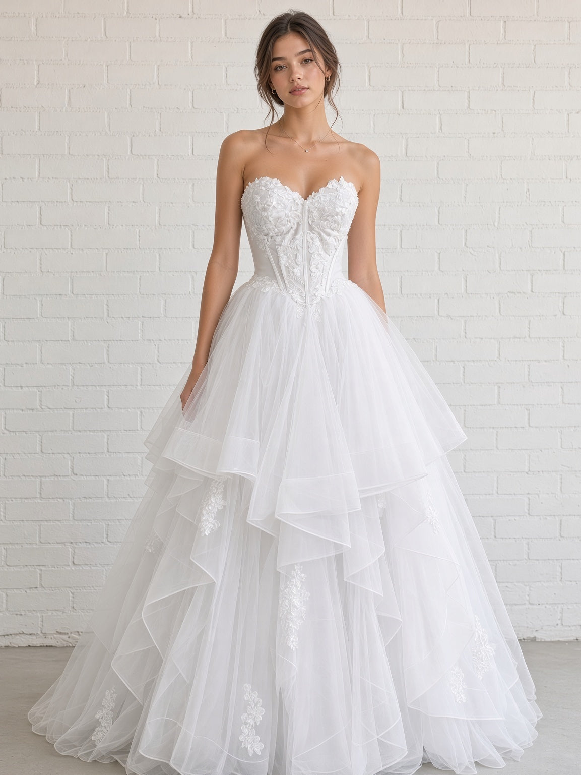 Skye V1 white floral lace debutante dress, front view on model with strapless corset and full ruffle skirt