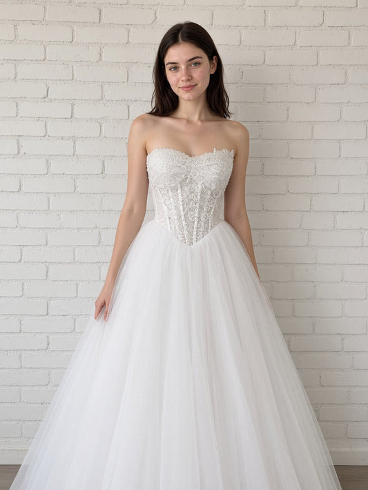 Trish V1 white debutante gown, front view on model with strapless lace corset and sparkle tulle skirt