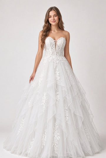 Willow V1 white plunge neck debutante dress, front view on model with strapless lace corset and full ruffle skirt