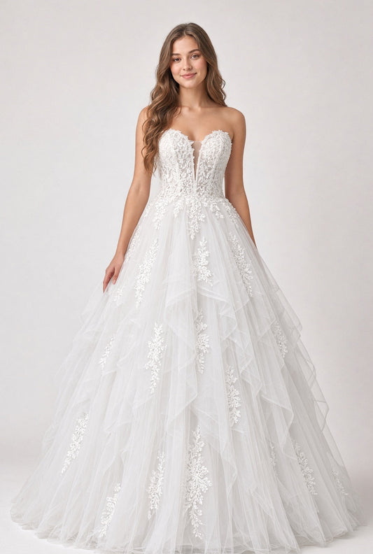 Willow V1 white plunge neck debutante dress, front view on model with strapless lace corset and full ruffle skirt