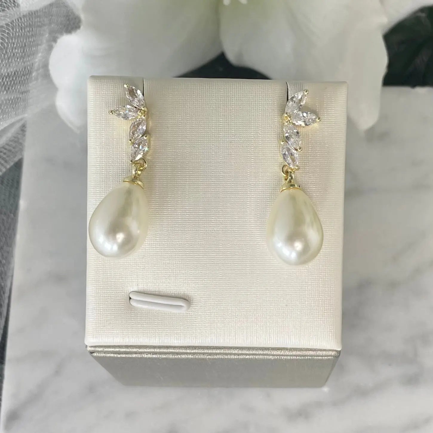 Zarina Leaf-Design Pearl Earrings – Bridal Jewelry Trend 2023.