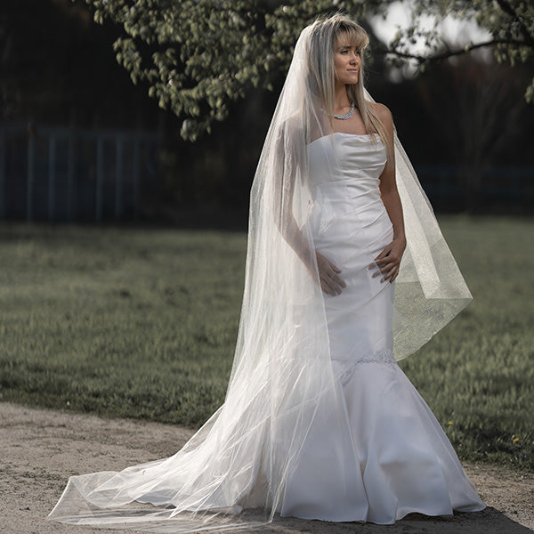Melody Draped Lace Wedding Gown by Divine Bridal.