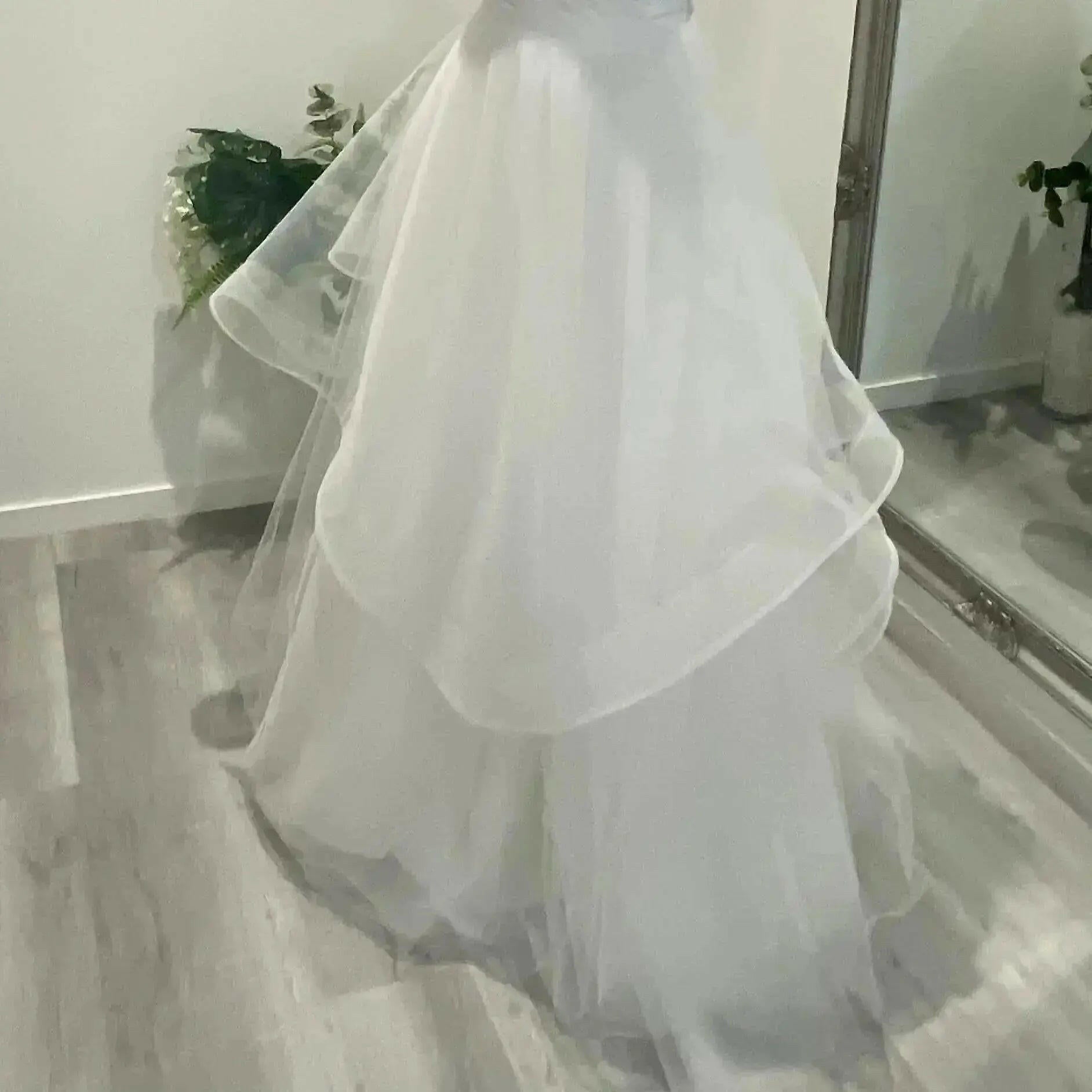 One-layer tulle ruffle skirt option for debutante dress customisation