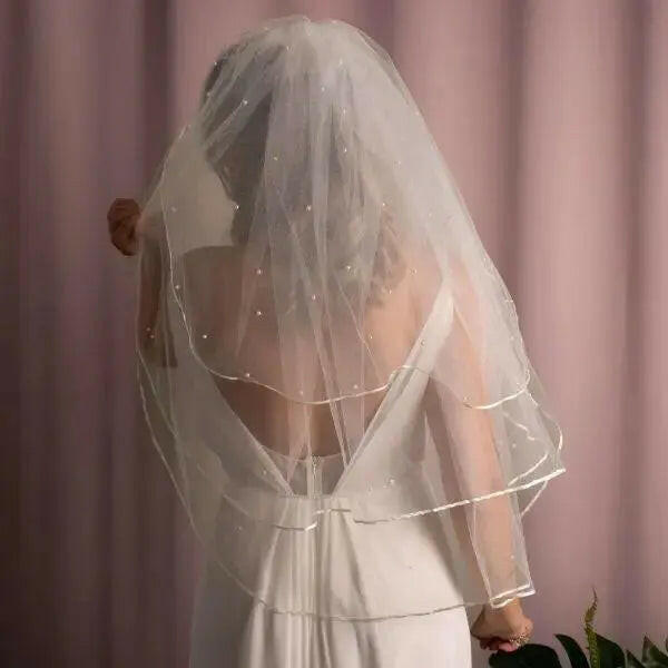 Elara Pearl Veil.