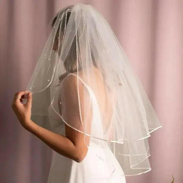 Elara Pearl Veil.