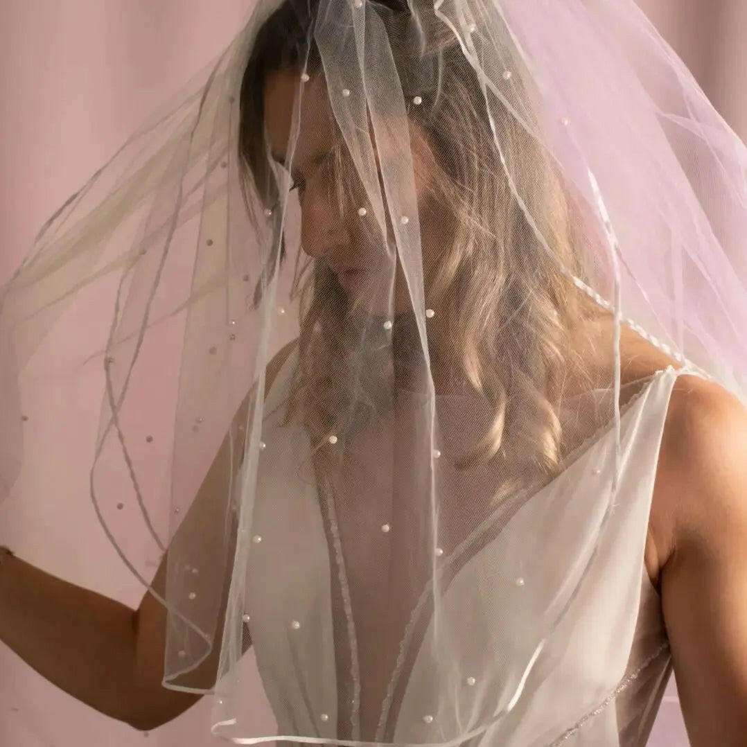 Elara Pearl Veil.