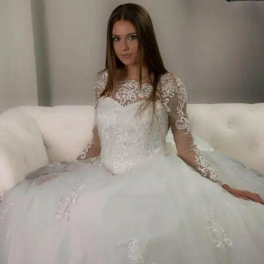 Ellis: Enchanting Lace Ball Gown.