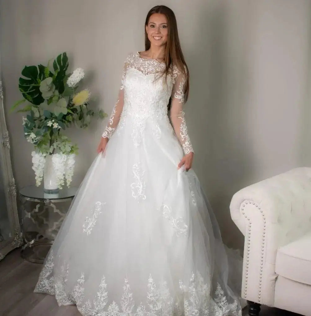 Ellis: Enchanting Lace Ball Gown.