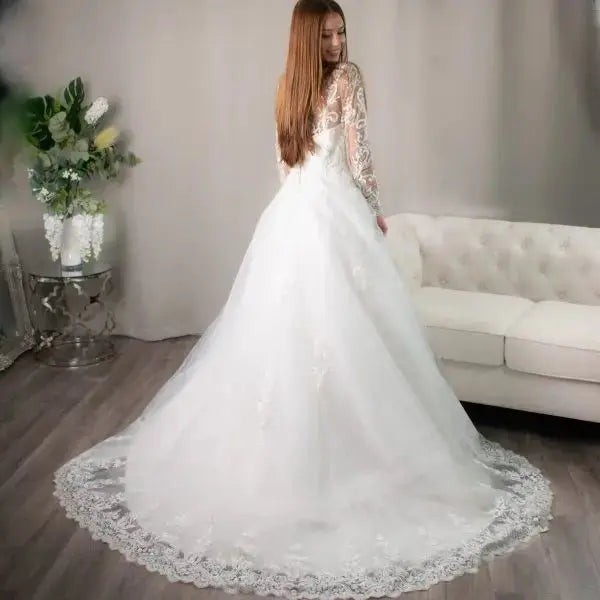 Ellis: Enchanting Lace Ball Gown.