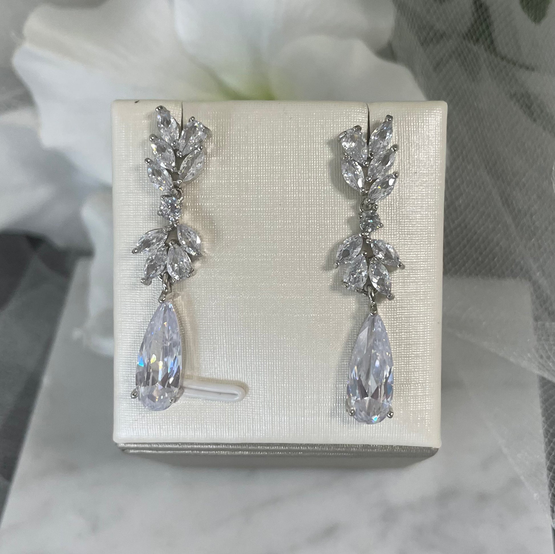Elegant Irene crystal earrings featuring sparkling cubic zirconia in a classic dangle design, available at Divine Bridal in Macleod, Victoria.