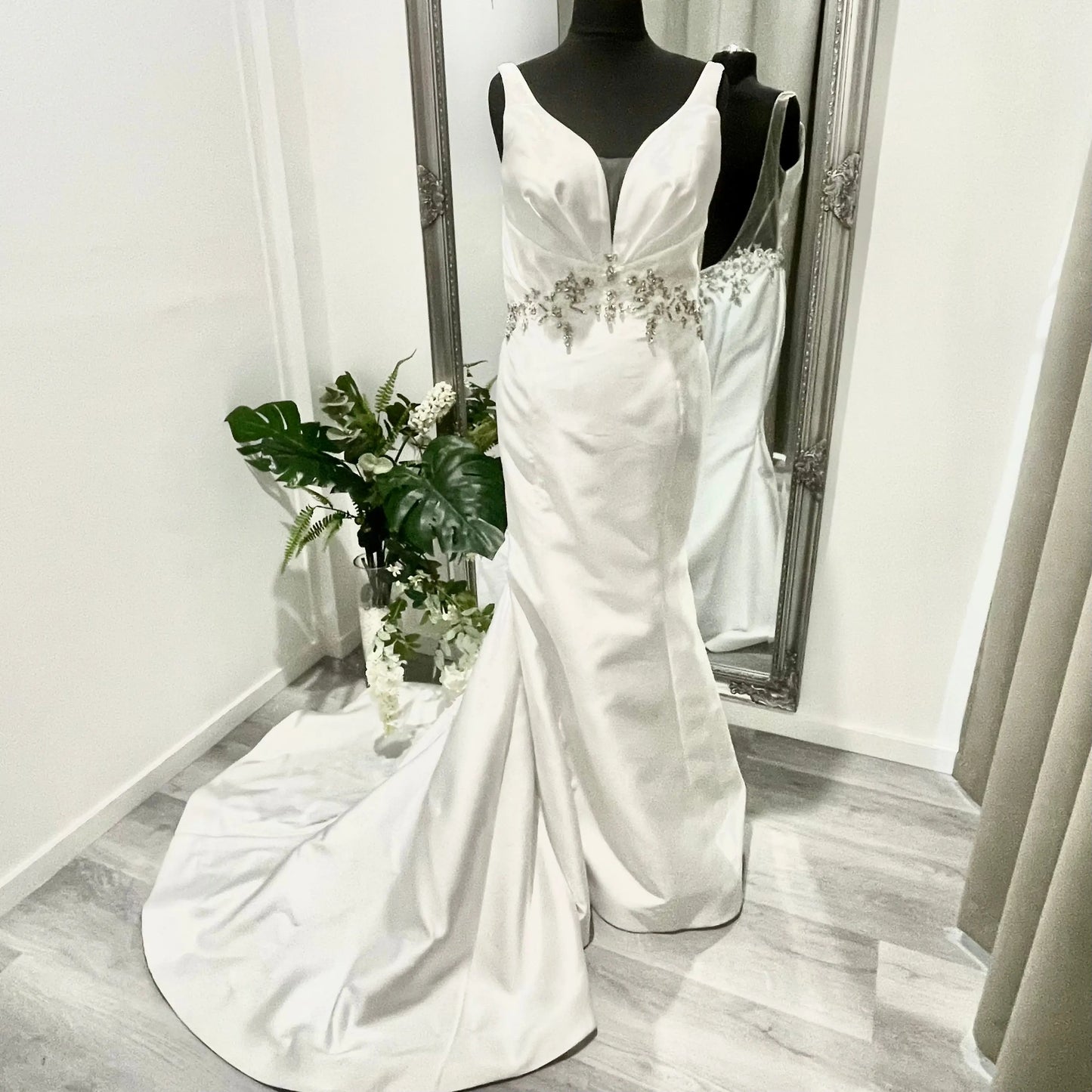 Ashley fit and flare wedding dress with lace beadwork and a chapel train.