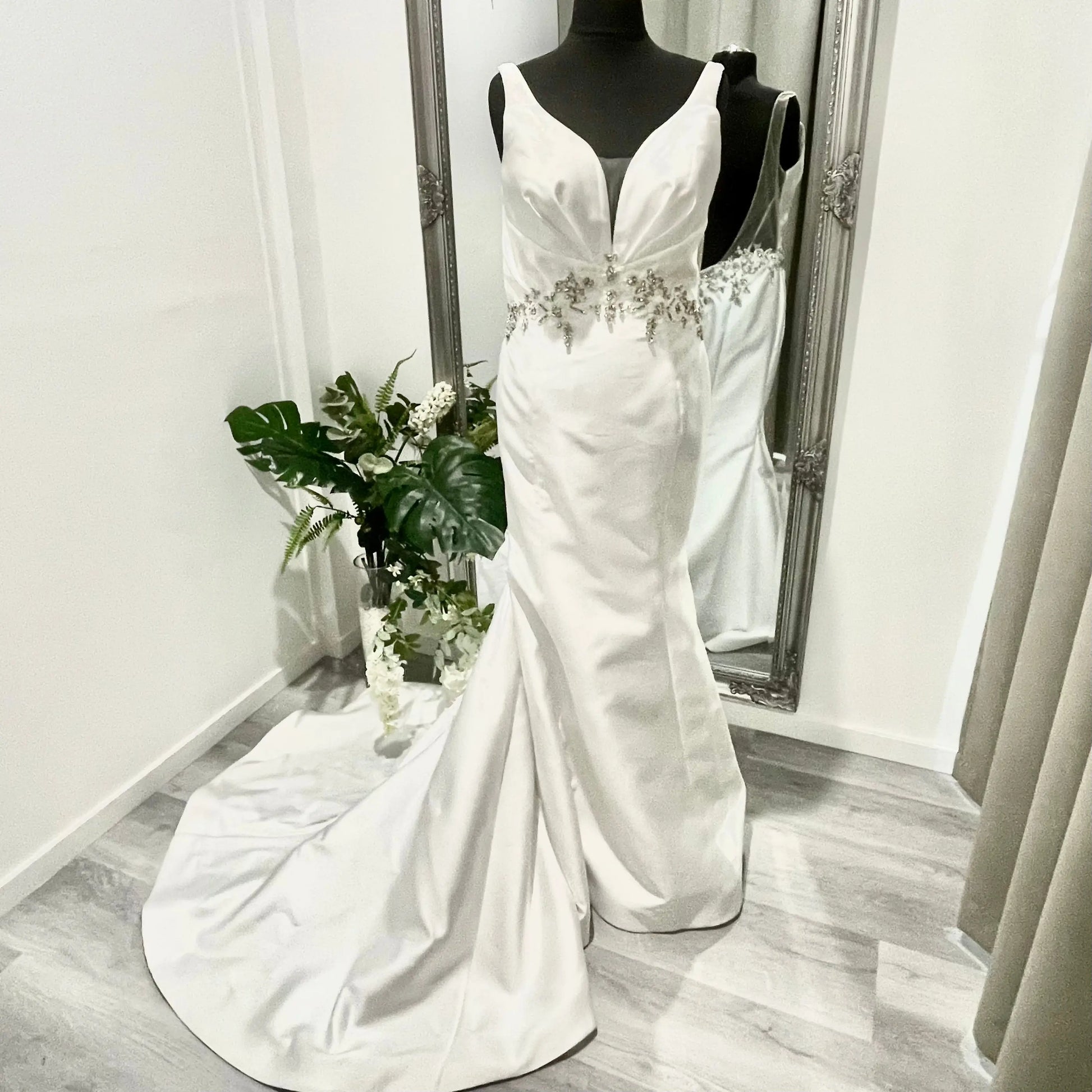 Ashley fit and flare wedding dress with lace beadwork and a chapel train.