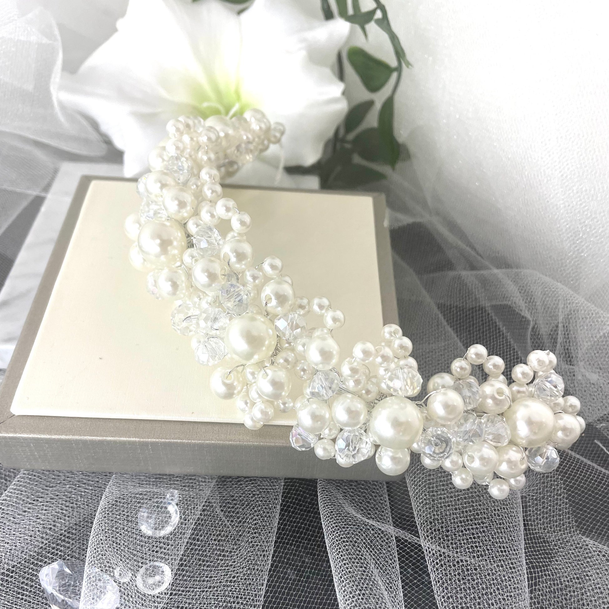 Exquisite Emily Bridal Headband, handmade with divine crystals and pearls, featuring a delicate wire-crafted design to enhance any elegant bridal ensemble.