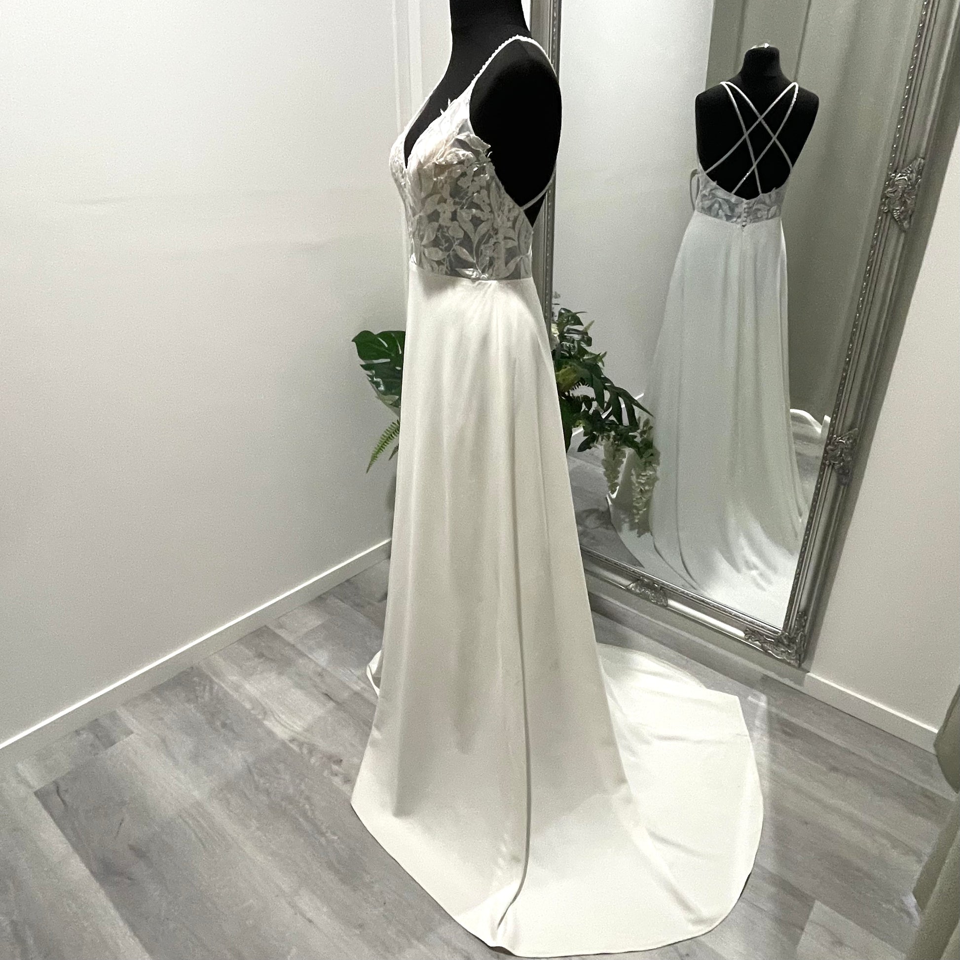 Full view of Krysta gown showcasing A-line silhouette and chapel train
