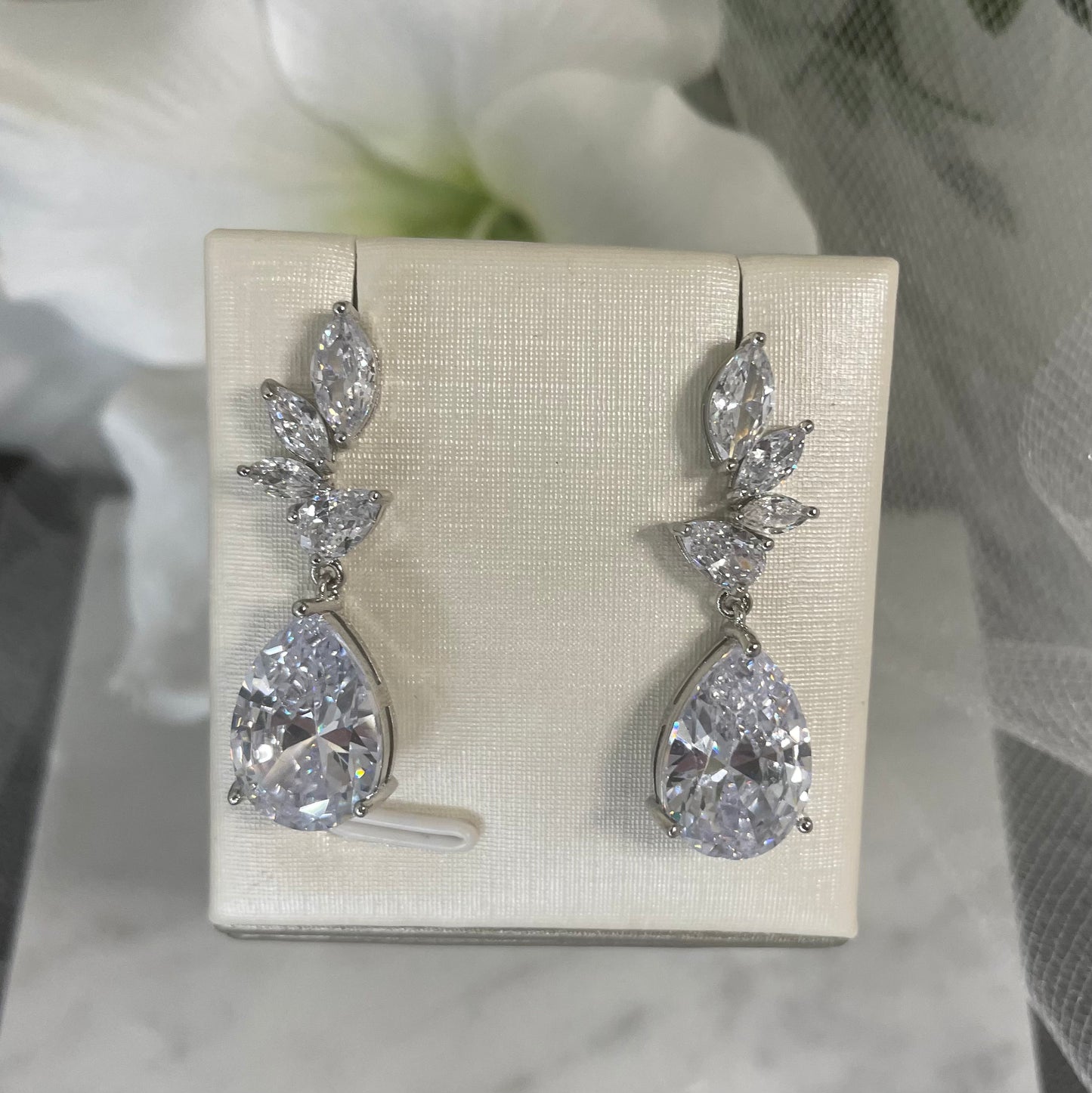 Elegant drop-style Cynthia Crystal bridal earrings showcasing a harmonious blend of modern and classic crystal elements.