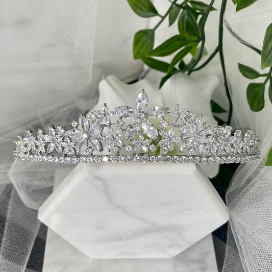 Brianna Bridal Tiara, featuring a stunning floral design with sparkling zirconia crystals, perfect for adding elegance and brilliance to any bridal outfit.
