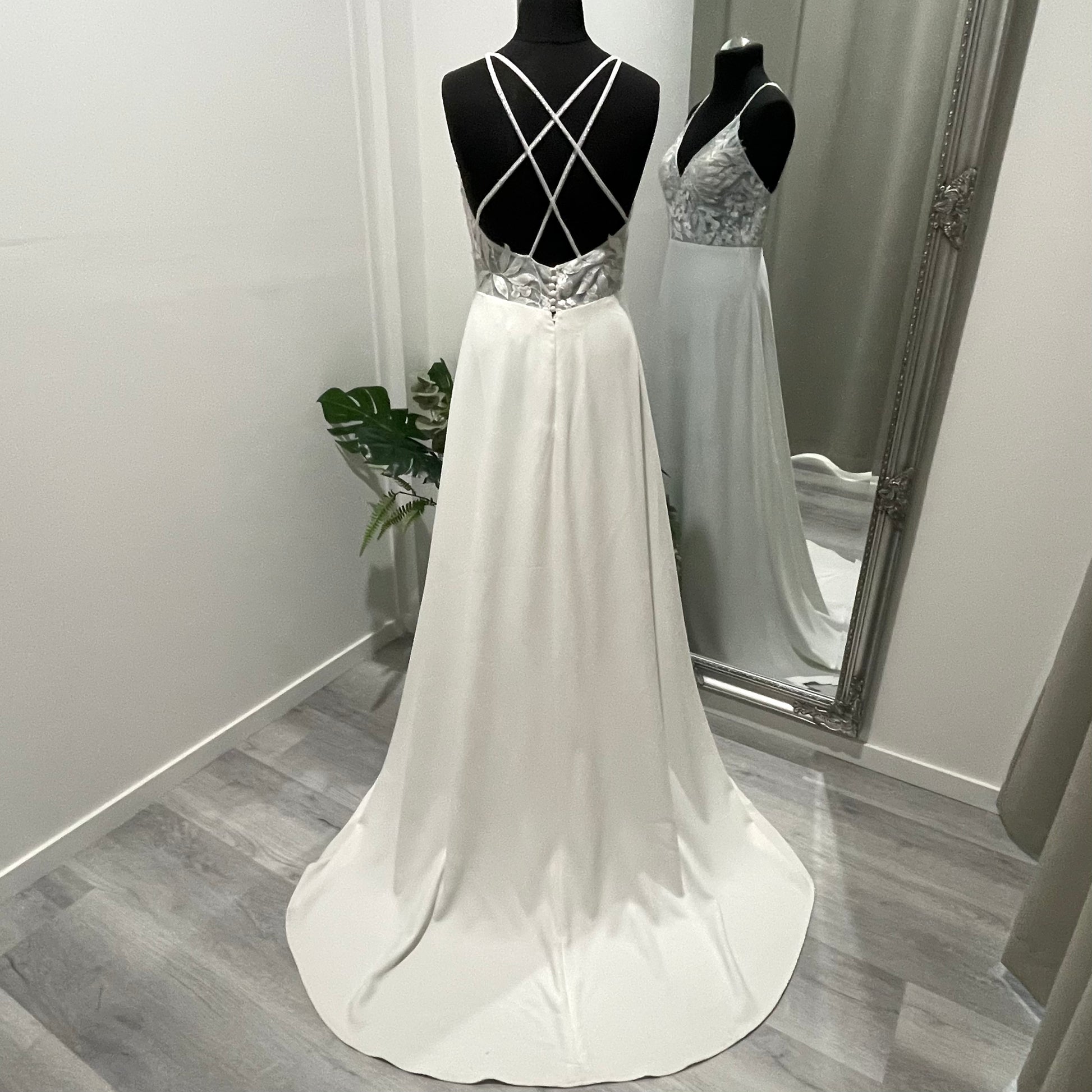 Full view of Krysta gown showcasing A-line silhouette and chapel train