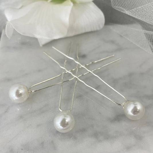 Bridal Pearl Hairpins on a silver base, perfect for enhancing wedding hairstyles with classic elegance and sophisticated pearl accents.