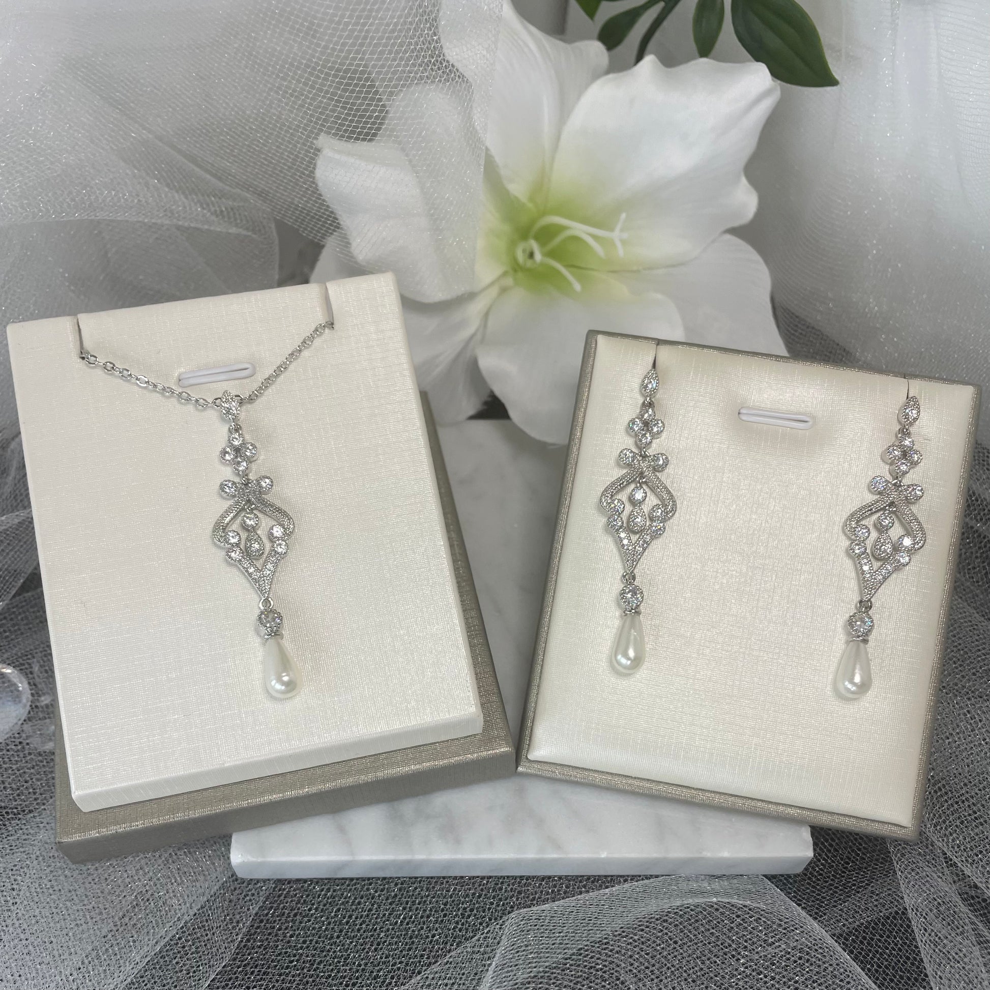 Elegant Maia Crystal Pearl Earring and Necklace Set with Indian-inspired design, ideal for adding cultural charm to bridal or wedding guest attire.