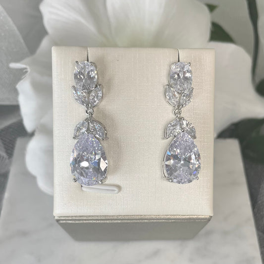 Gigi crystal bridal earrings with sparkling teardrop and leaf-design crystals, epitomizing wedding jewellery elegance.