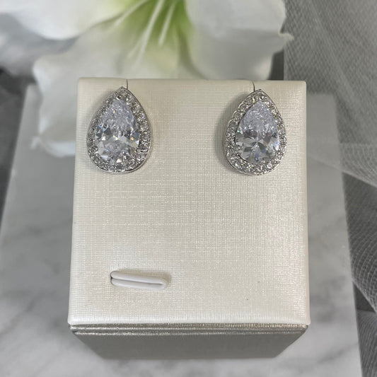 Lizzie Crystal Stud Earrings featuring a mix of pear and baguette crystals in a sophisticated silver finish, ideal for adding elegance to any outfit.