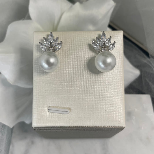 Hannah crystal pearl earrings with a sparkling cluster design and a classic pearl drop, blending timeless elegance with modern sophistication.