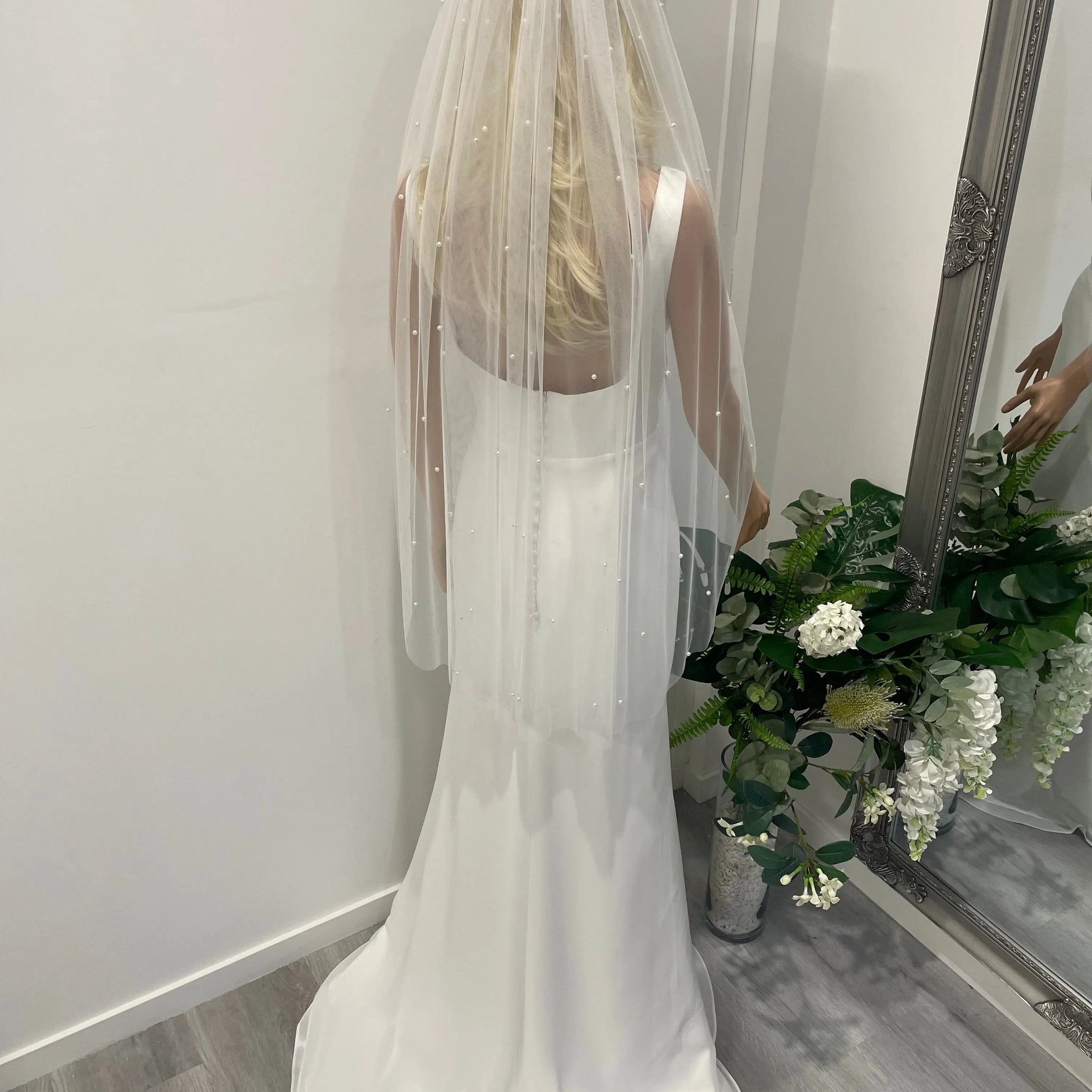 Bride wearing 1m pearl bridal veil with soft tulle – back view