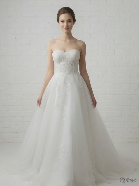Coco Floral Lace Strapless Debutante Ball Gown - model turning in elegant white floral lace ball gown for Melbourne debutante