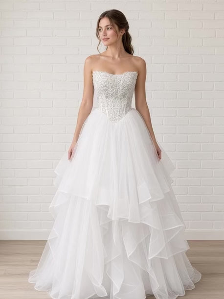 Loretta V1 pearl debutante dress video – strapless pearl lace corset gown with full ruffle skirt shown on the model